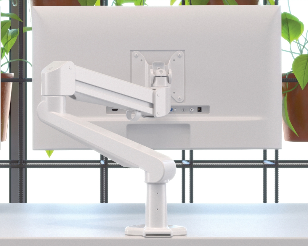 Image of a monitor arm on a desk